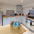 Ocean Colour Blue Holiday Cottage in Cornwall Kitchen