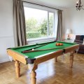 Dining table becomes a pool table